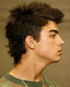 long curly faux hawk hairstyle for male