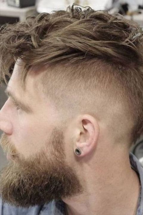 blended faux hawk hairstyle for men