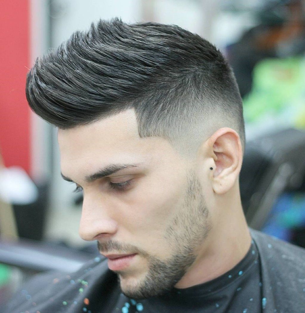 skin fade faux hawk hairstyle for men