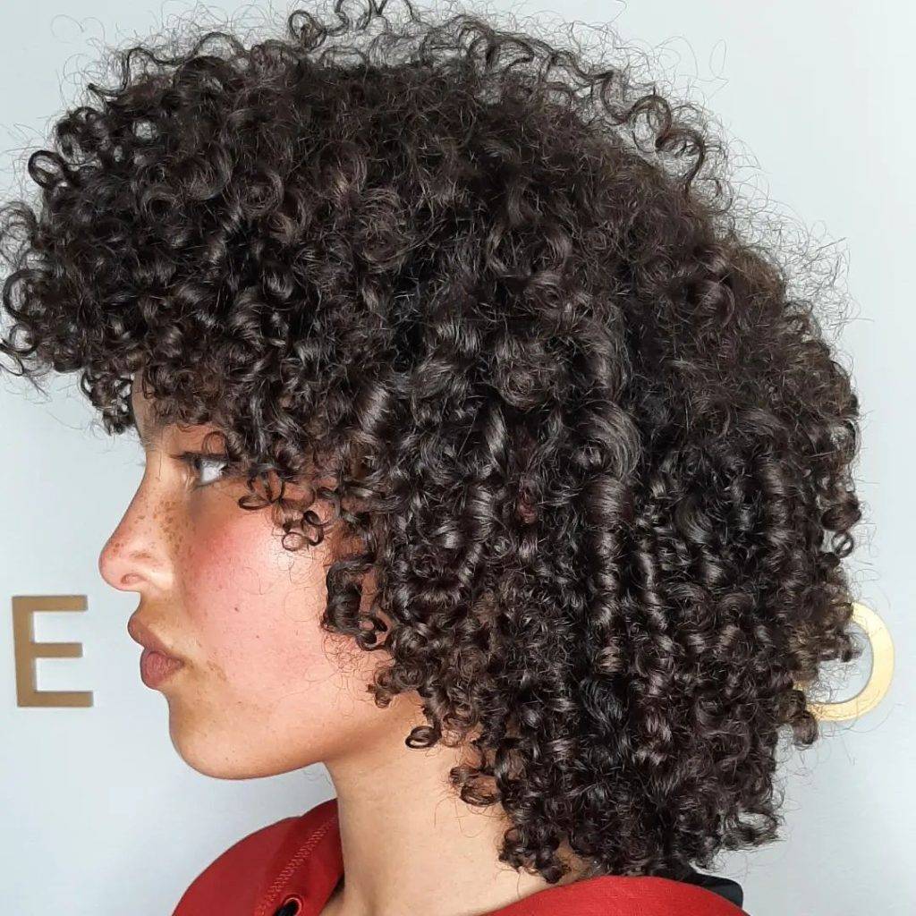 Short curly hairstyle for Women 5 Cute short curly hairstyles for older ladies | Haircuts for semi curly hair Female | Hairstyles for short curly hair black girl Short Curly Hairstyles