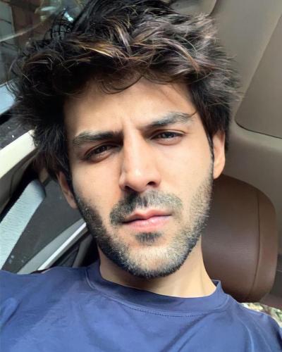 Indian Actor Kartik Aaryan hairstyles for men