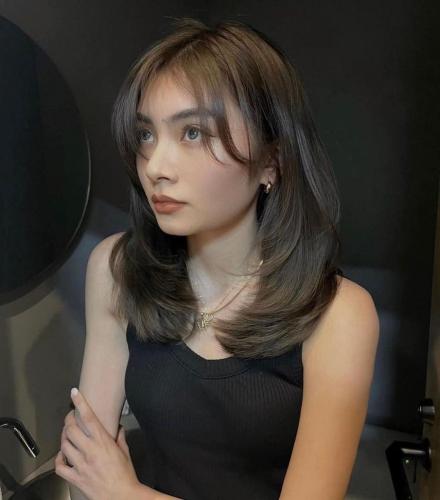 Layered-Haircut-with-Bangs-140