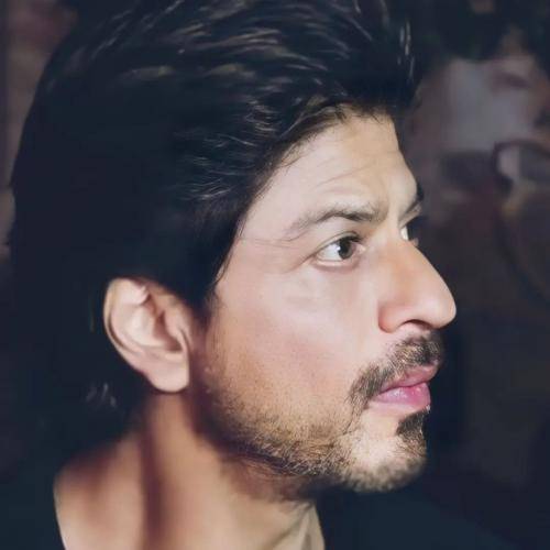 Shahrukh khan close up shot with medium clean cut hairstyle