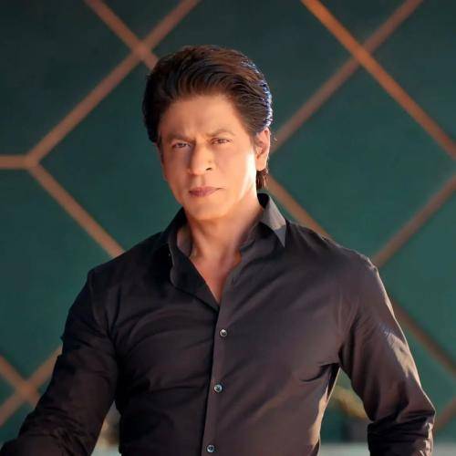 Shahrukh khan in black shirt with slicked back hairstyle