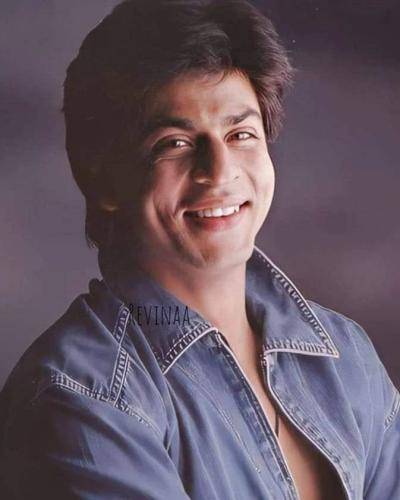 Shahrukh khan in blue denim shirt with regular hairstyle